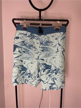 Volcom Teal Swim Shorts with Light Blue Marble.